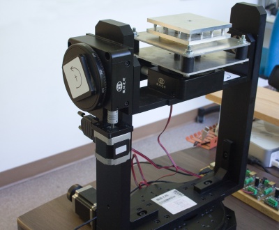The rotation platform we use to calibrate our accelerometers and spatial devices. The device being calibrated is secured within the aluminium plates at the top, and the platform rotates on all three axes.